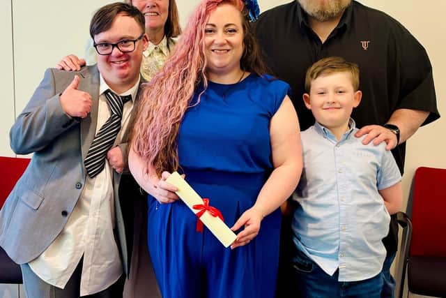 Nancy Fellows (centre) holds her Havant Honorary Citizen award certificate surrounded by proud family members – left to right Conor Hayes (cousin), Deborah Hayes (aunt), Graham Fellows (husband) and Harvey Fellows (son).