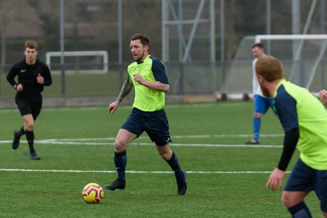 Jake Daniels on the ball for Harvest against West Wight. Picture: Vernon Nash