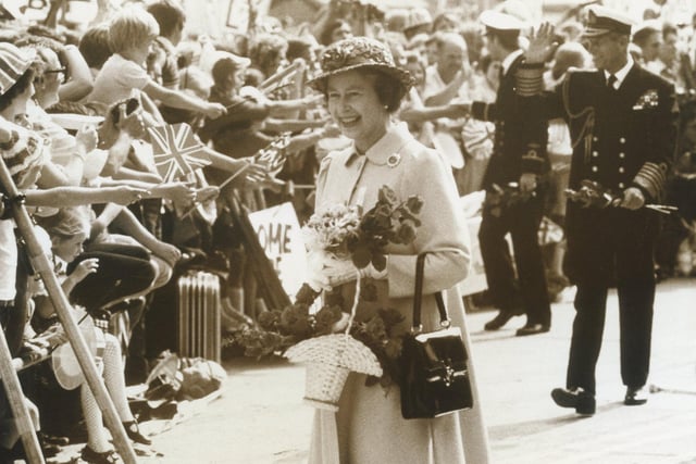 The Queen is in Portsmouth to greet HMS Invincible on September 18, 1982. The News PP4045