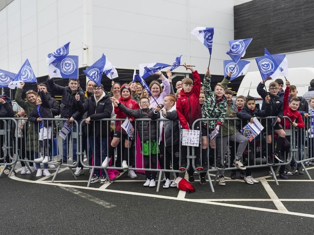 Some young autograph hunters wait for the players at arrive ahead of the Reading game