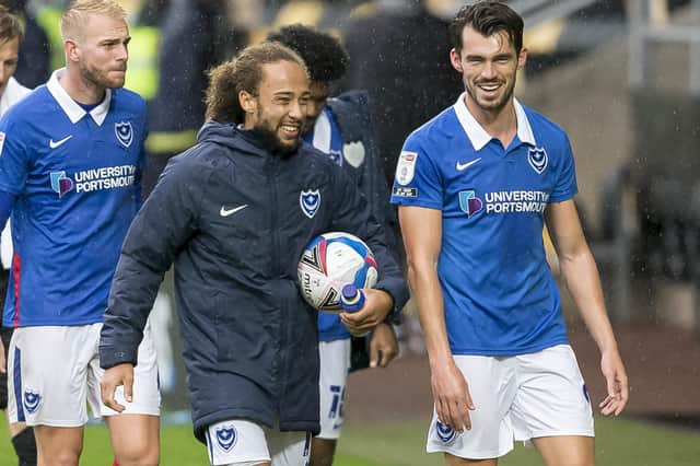 Marcus Harness, left, has three league goals for Pompey this season while John Marquis is yet to get off the mark.  Picture: Daniel Chesterton/phcimages.com