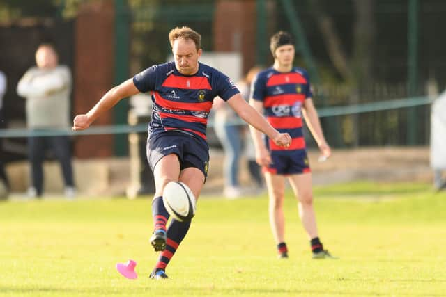 Lewis Murray kicks the late penalty which gave USP victory over Fareham Heathens. Picture: Keith Woodland