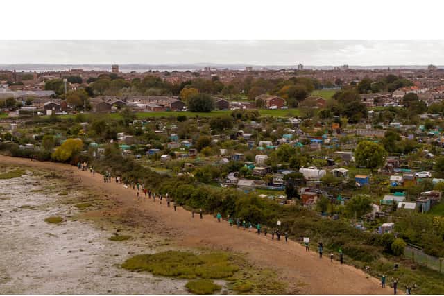 An aerial drone shot of protestors who are angry about the Aquind interconnector plan
Picture: Solent Sky Services