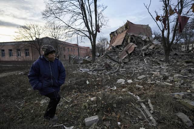 A woman walks past a school heavily damaged during a Russian attack in Kramatorsk, Donetsk region, Ukraine Picture: AP Photo/Libkos