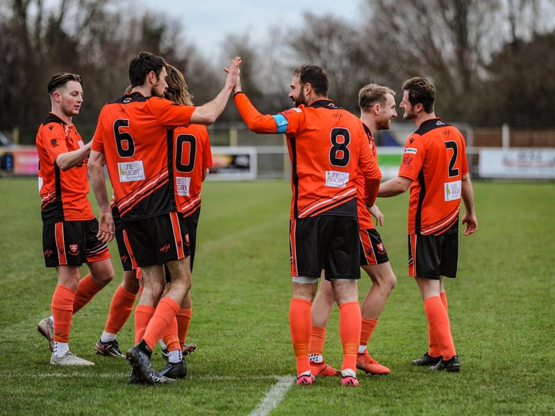 Portchester players congratulate goalscorer Brett Pitman. Picture by Daniel Haswell