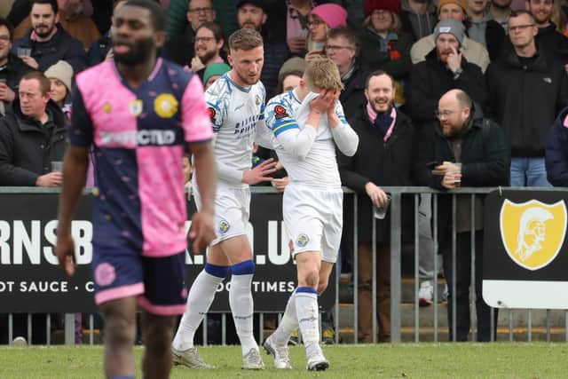 Joe Newton covers his face after being shown an early red card at Dulwich. Picture by Dave Haines
