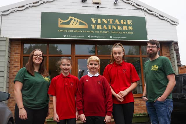 The lucky winners of the Vintage Trainers Poster Competition, Lily Smith, 11, Rudy Jones, 10 and Lily Rose Fitzwilliam, 11 of Purbrook Junior School attended the shop to choose and restore a set of trainers which they will eventually get to keep. Picture: Alex Shute