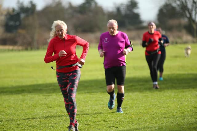 Jenny Lucas, from Shaftesbury, left, taking part in the Great Salterns parkrun
Picture: Chris Moorhouse