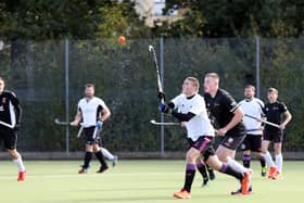 Tristan Barnes waits for the ball to drop during Portsmouth 2nds' loss at  Fareham 4ths. Picture: Chris Moorhouse