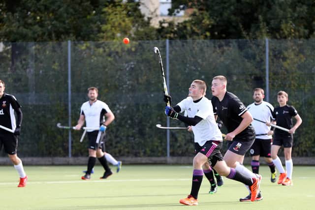 Tristan Barnes waits for the ball to drop during Portsmouth 2nds' loss at Fareham 4ths. Picture: Chris Moorhouse