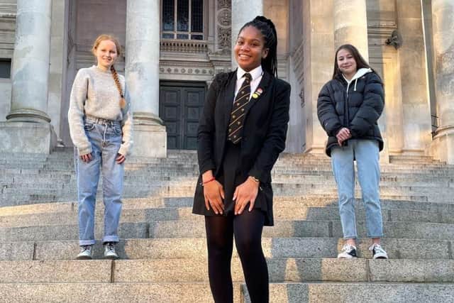 Destiny Rose-Forde Kennedy, 16, with  Ella Reilly, 17, (left) and Willow Lindstrom-Fabik, 13, (right).