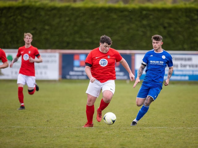 Action from Gosport Town's 4-0 victory over Lee Rangers (blue kit) in the Portsmouth & District FA Trophy final at Cams Alders. Picture: Alex Shute