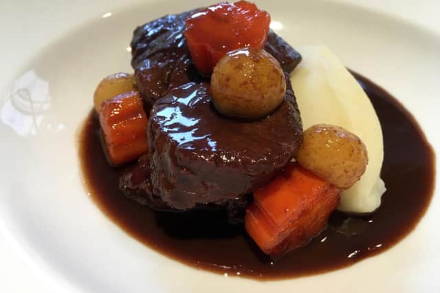 Braised Venison with vegetables and creamy mash.