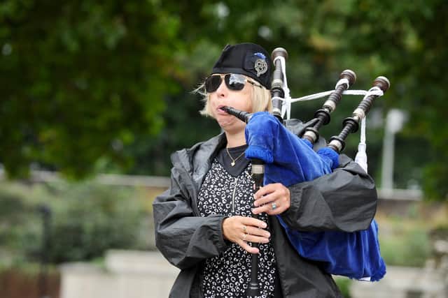 Piper Caroline Henton at the Guildhall Square vigil Picture: Sarah Standing (090922-373)