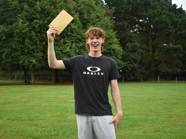 Peter Headley at Bay House collecting his GCSE results