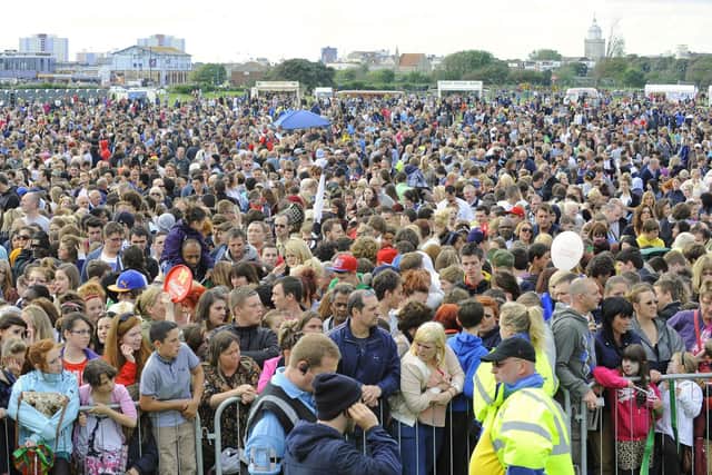 Crowds on Southsea Common in 2012 when the Olympic Torch passed through the city.
Picture: Malcolm Wells