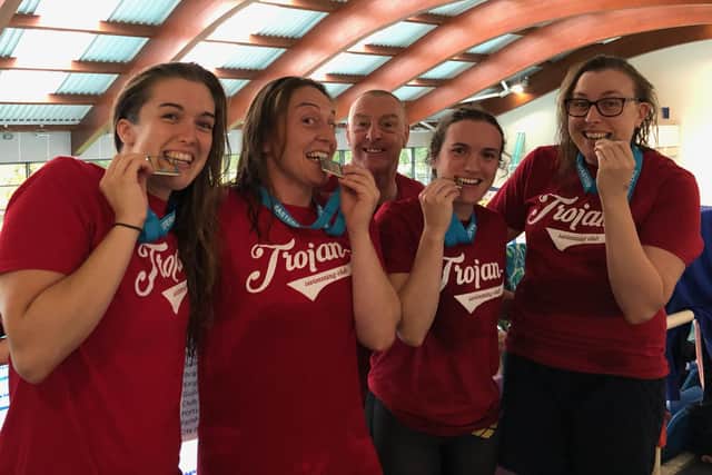 Trojan medallists at Crawley (from left): Lucy Strowger, Steph Baron, Tony Corben (head coach), Sophie Hutin, Rachel Jepson