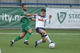 Benny Read battles with Kieron McCann during the FA Cup first round win against Cray Valley. Hawks earned £12,500 from the BBC for having that tie streamed, and will bank a further £37,500 from the second round visit to Marine being shown live on BT Sport.Photo by Dave Haines.