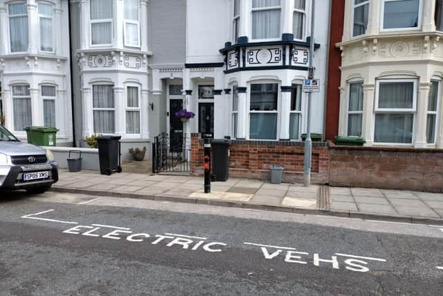 An electric vehicle charging area.