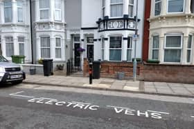 An electric vehicle charging area.