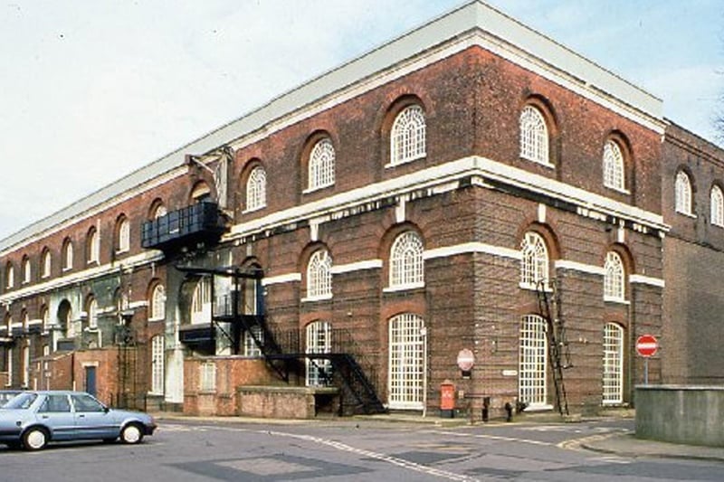 The iron foundry and smithery was built 1857-1861, by Col GT Greene RE and Andrew Murray, Chief Engineer; extended 1878, with later alterations and the main part of the building was converted to office use in 2003. The east wing (Building 1/136) remains unused and at risk, Historic England says. There were concerns over drainage and regular flooding of the building but this has been resolved.