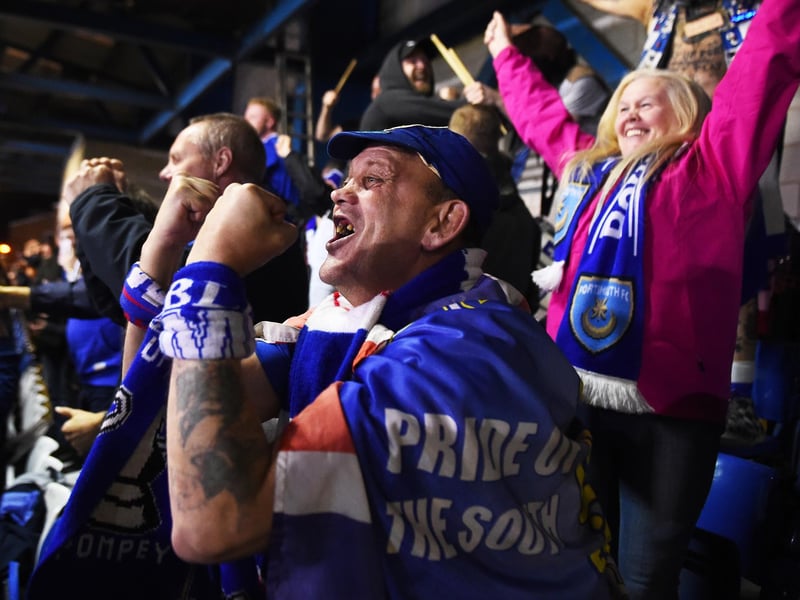 Pompey fans celebrate a goal during a Checkatrade Trophy win at Bury in February 2019. Photo by Nathan Stirk/Getty Images