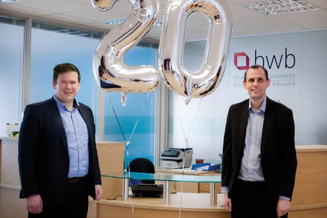  Associate Director Andrew Kershaw and Business Adviser Chris Wignall celebrate 20 years at HWB.