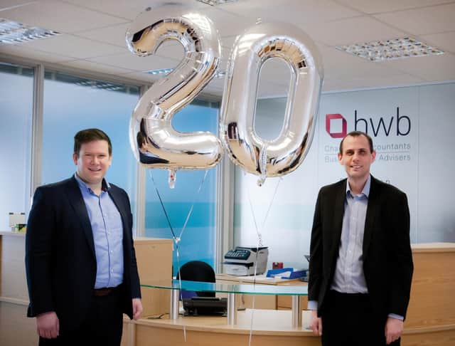  Associate Director Andrew Kershaw and Business Adviser Chris Wignall celebrate 20 years at HWB.