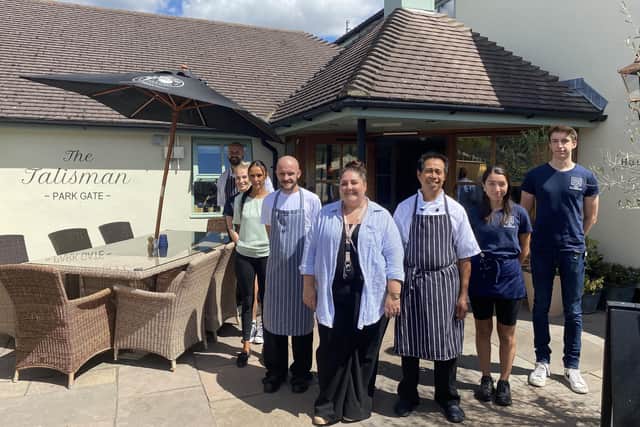 General manager Harriet Chase (front middle) with the Talisman team.