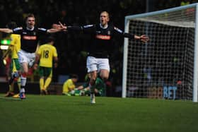 Scott Rendell celebrates his late winner at Carrow Road in January 2013 as Luton become the first club to knock a Premier League side out of the FA Cup on their own ground. Photo by Jamie McDonald/Getty Images.