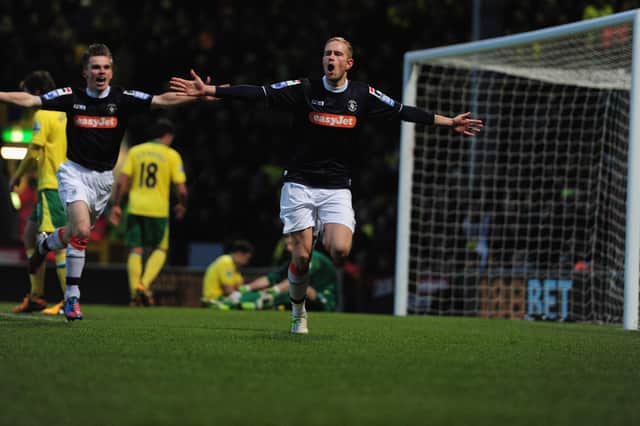Scott Rendell celebrates his late winner at Carrow Road in January 2013 as Luton become the first club to knock a Premier League side out of the FA Cup on their own ground. Photo by Jamie McDonald/Getty Images.