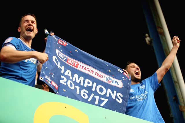 Michael Doyle (left) celebrates winning the League Two title with Gareth Evans in May 2017. Picture: Harry Murphy/Getty Images