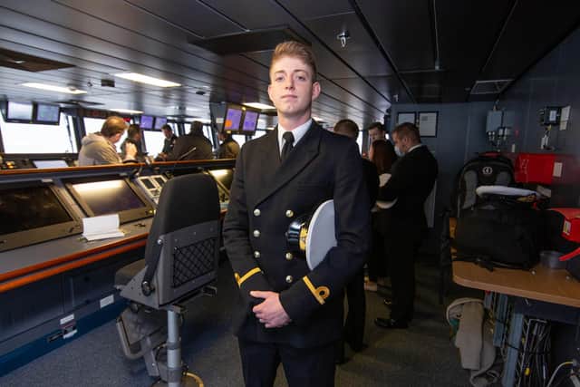 New to the team: Sub-Lieutenant Dylan Shaw-Pritchard, 22,  on the bridge of HMS Prince of Wales ahead of the ship's departure from Portsmouth.

Picture: Habibur Rahman