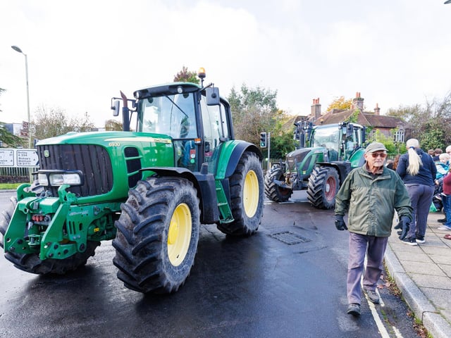 Crowds gathered in Wickham Square to watch the procession of tractors go by all to raise money for Rowans Hospice and Guide Dogs.