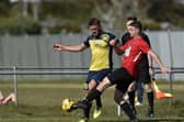 Ethan Jones, right, fired home in the shoot-out Fareham's penalties win over Brockenhurst. Picture: Allan Hutchings (030421-289)