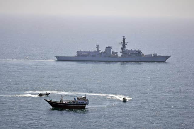 HMS Montrose, which is currently based in the Gulf, is pictured approaching a suspicious dhow while operating as part of Combined Maritime Forces (CMF) counter-narcotics operations in the Northern Arabia Sea.