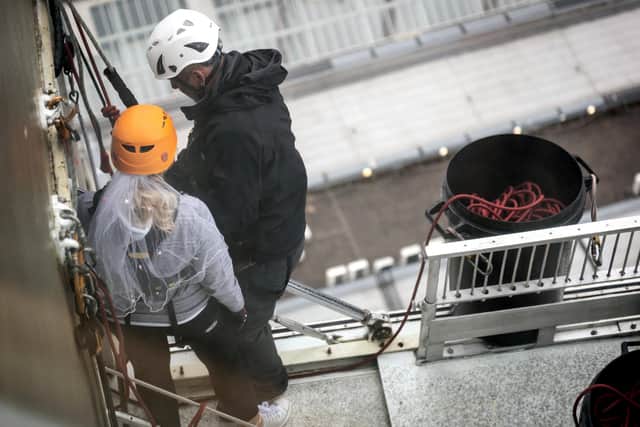 Kerrie getting ready to abseil. Credit: James Anderson at Outside and Instant Photography