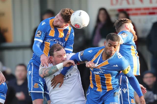 Second best - Hawks striker Danny Kedwell is crowded out by Wealdstone defenders. The Stones were today promoted to the National League but Hawks have missed out. Picture: Dave Haines