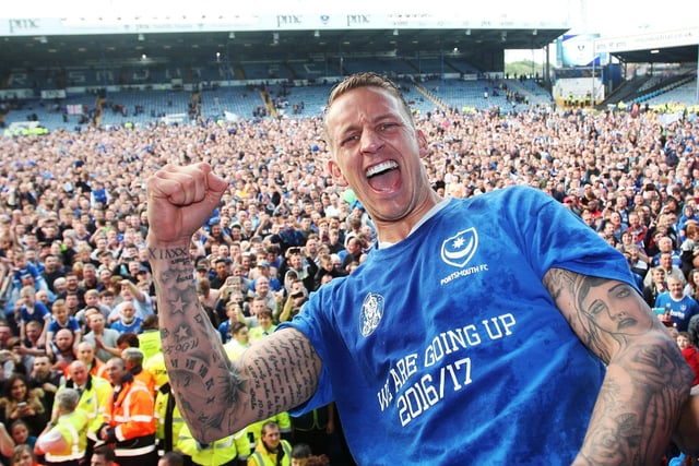 Fans swarmed the pitch to celebrate Pompey's promotion to League One in 2017.