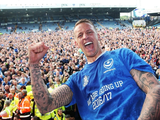 Fans swarmed the pitch to celebrate Pompey's promotion to League One in 2017.