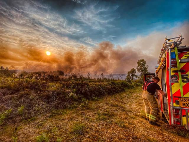 A firefighter on the scene of the Longmoor Camp blaze.