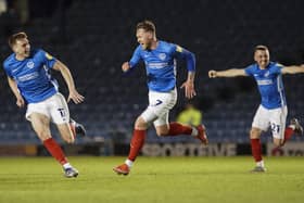 Aiden O'Brien celebrating his dramatic late winner in Pompey's remarkable 3-2 success over Wigan in the final Fratton Park match of the season. Picture: Jason Brown/ProSportsImages