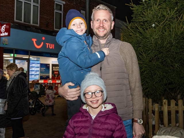 The Wells family from Westbourne wait for Santa to turn on the Christmas lights. Photos by Alex Shute