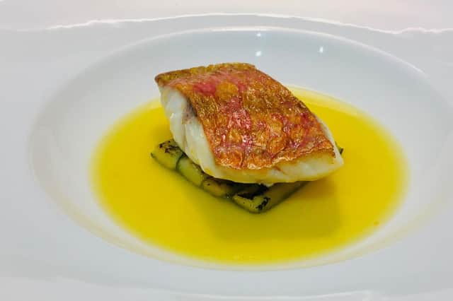 Red mullet, tomato saffron water, pickled cucumber by Lawrence Murphy