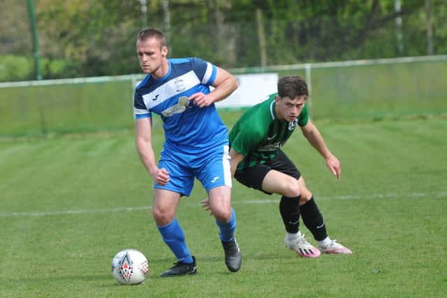 Harvest (blue) v Andover New Street Swifts. Picture by Ian Grainger.