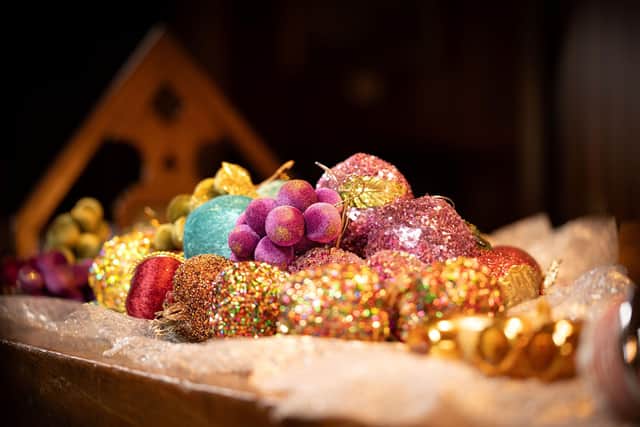 Preparing decorations for A Palace House Christmas at Beaulieu