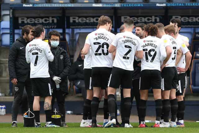 Danny Cowley speaks to his Pompey players during Saturday's 2-1 win at Shrewsbury which lifts them into fifth spot. Picture: Barrington Coombs/PA Wire