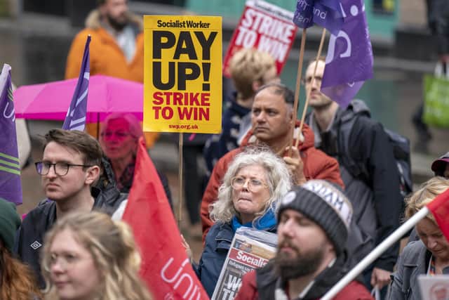 Members of the UCU union carried out strikes and marking boycotts across the UK amid an ongoing row over pay and conditions. Pictured is striking staff in Buchanan Street, Glasgow. Picture: Jane Barlow/PA Wire