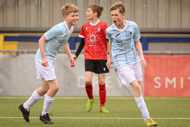 Action from the Portsmouth Youth League Geldard Invitation Cup final between Jubilee 77 U13s and Castle United U13s (light blue and white kit). Picture: Keith Woodland (190321-403)
