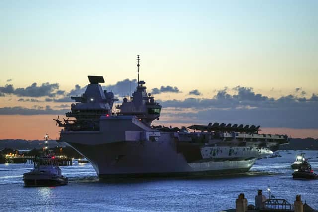 HMS Queen Elizabeth departs HM Naval Base, Portsmouth, for her maiden deployment to lead the UK Carrier Strike Group on a 28-week operational deployment travelling over 26,000 nautical miles from the Mediterranean to the Philippine Sea. Picture date: Saturday May 22, 2021.